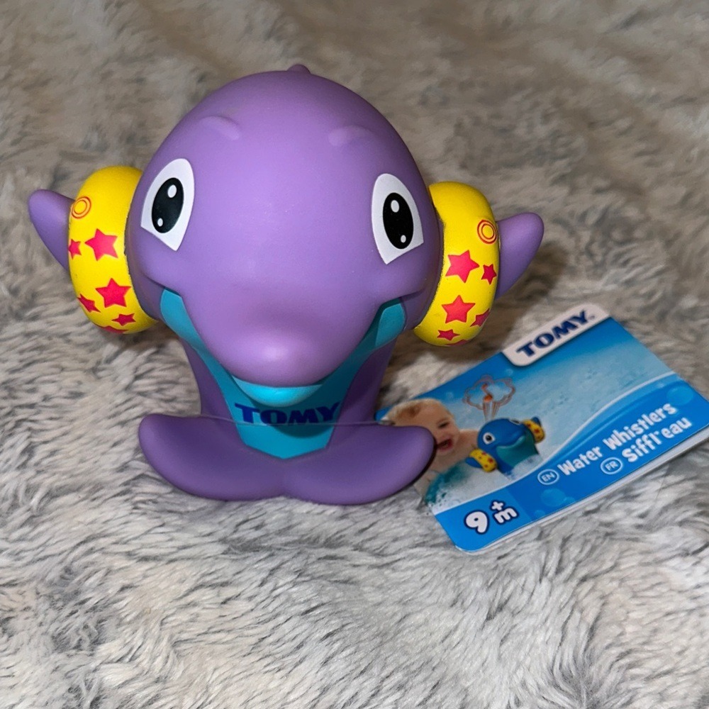 TOMY Water Whistlers Purple Dolphin Bath Toy E72379 Squirter Whistle 9m+